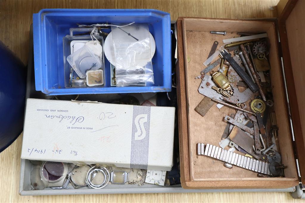 A quantity of mixed clock and watch parts including dials and glasses